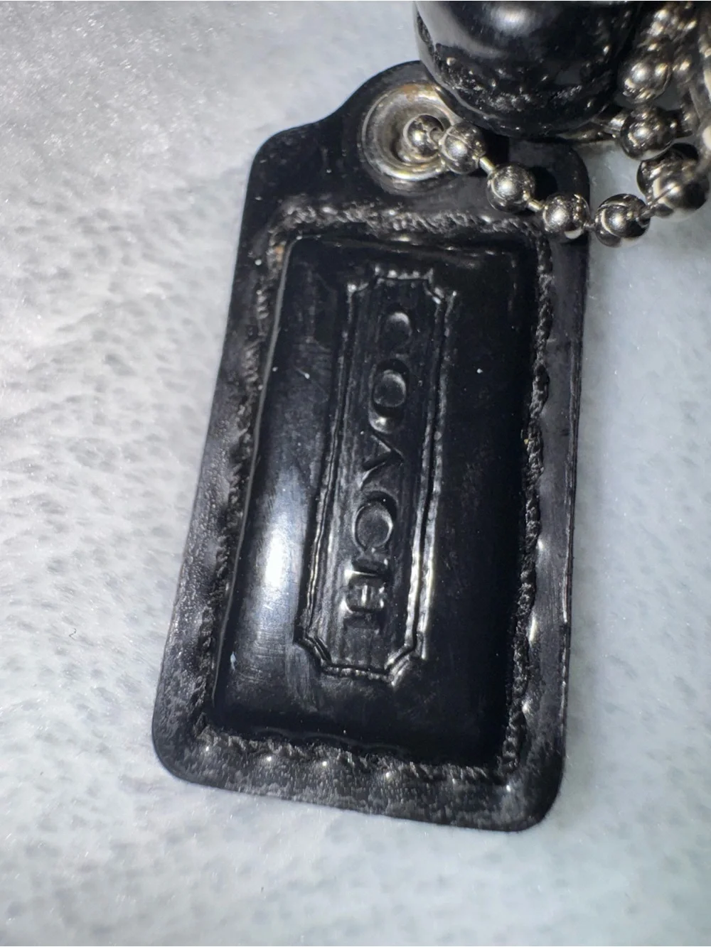 Coach Black Signature Jacquard Wristlet Pouch with Silver Emblem